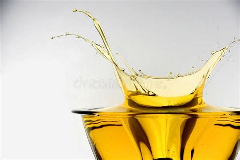 Oil Splash Side View Of Cooking Oil Splashing In Container Studio