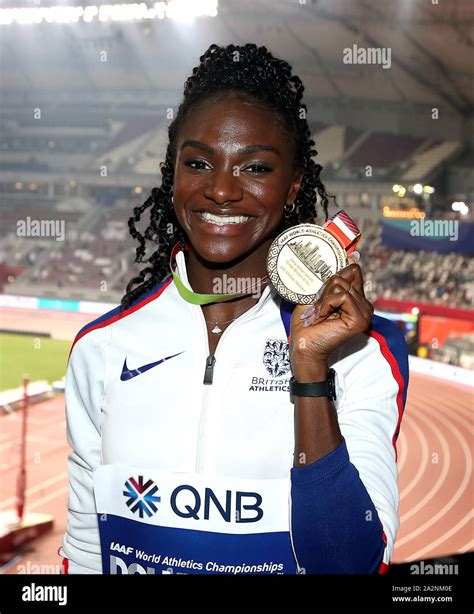 Great Britains Dina Asher Smith Receives Her Gold Medal For The Womens 200m Final During Day