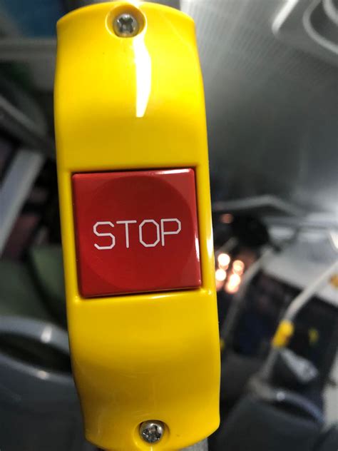 The O on the stop button on my bus is in the shape of a stop sign : mildlyinteresting