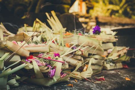 Traditional Balinese Offerings To Gods In Bali With Flowers And Aromatic Sticks Bali Indonesia