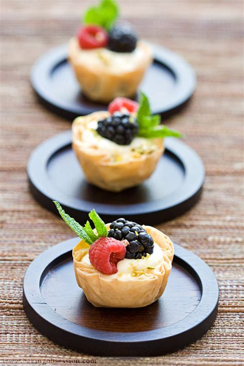 A light dessert idea that is simple enough for kids and variations on easy phyllo cups with fruit. Fresh Berry and Cream Cheese Mousse Phyllo Tartlets | Baking Obsession