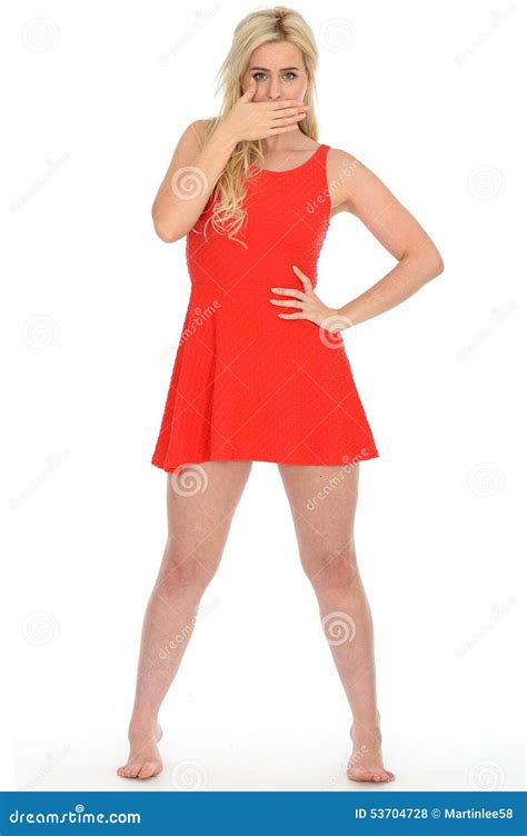 Attractive Sexy Shocked Young Blonde Woman Wearing A Short Red Mini