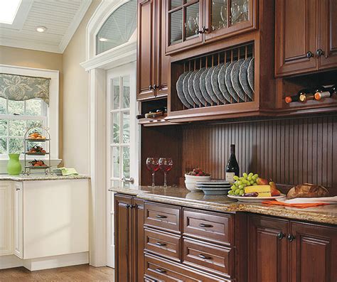 But this idea can be a little limiting. Small Kitchen Design with Traditional Cabinets - Decora