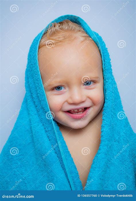Little Baby Smiling Under A White Towel Smiling And Laughing Kid