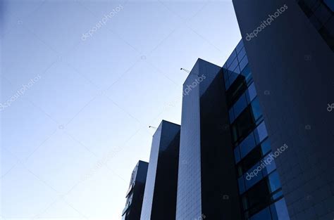 Office Building Under Blue Cloudless Sky Stock Photo By ©mproduction
