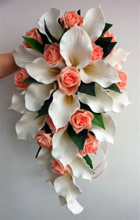Peach Roses And Lily Bouquet
