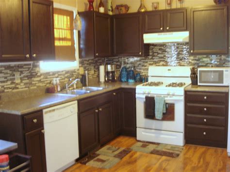 Rustoleum cabinet transformations review and affordable kitchen cabinet makeover ideas. After refinishing the cabinets with Rustoleum cabinet ...