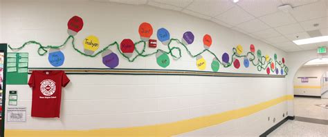 Elementary Hallway Display With Student And Teacher Names On Bulbs