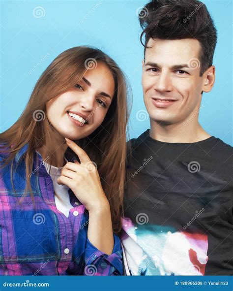 Happy Couple Together Posing Cheerful On Blue Background Guy And Girl