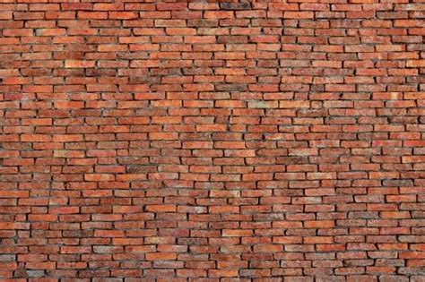 An Image Of A Brick Wall That Looks Like It Is Made Out Of Red Bricks