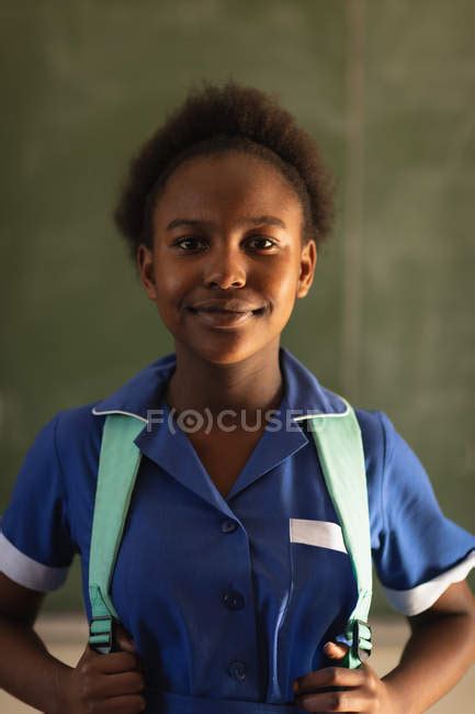 Portrait Close Up Of A Young African Schoolgirl Wearing Her School