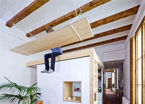 First, get the exact measurements of the room where the suspended ceiling will be installed. Dine and Dangle: Suspended Table Hangs Over Living Area ...