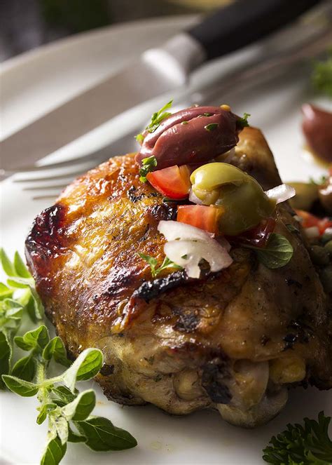 This is chicken brine makes the most succulent, juiciest roast chicken you will ever have in your life! Grilled Mediterranean Chicken Thighs with Olives and Tomatoes - Just a Little Bit of Bacon