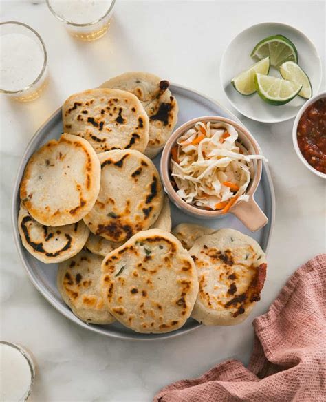 The cuisine of el salvador is similar to that of its central american neighbors, with a strong reliance on indigenous foods like corn, beans, squash and tomatoes. Pupusas Recipe w/ Curtido and Salsa Roja {Authentic ...