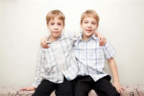 Two Twins Brothers Hugging And Smiling Stock Image Image Of Human