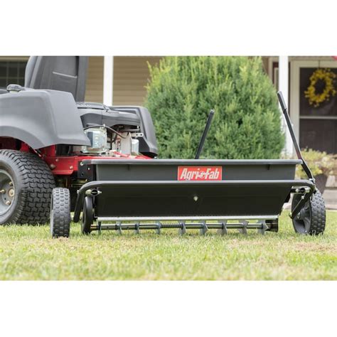 Agri Fab 100 Lb Capacity Spike Aerator Drop Tow Behind Spreader In The