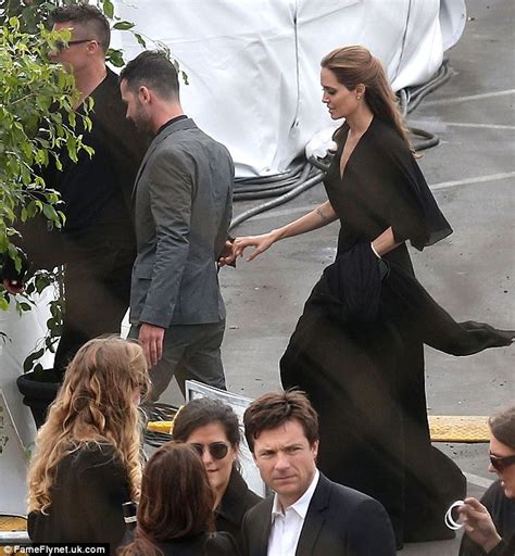 Angelina Jolie Flashes Her Infamous Jolie Leg And Spanks Brad Pitt S