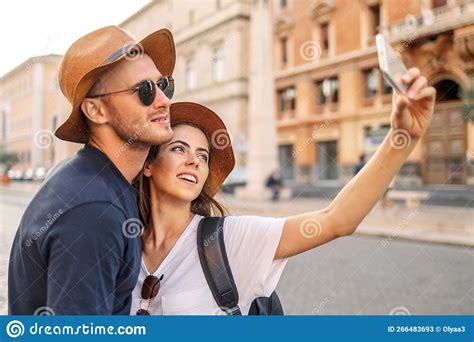 Happy Young Couple Taking Selfie Portrait With Smartphone Mobile Outdoor Tourism Friendship