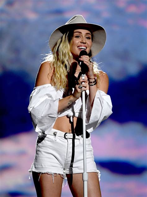 Miley Cyrus Debuts A New Look—and A New Sound—for Her Billboard Awards Performance Vogue