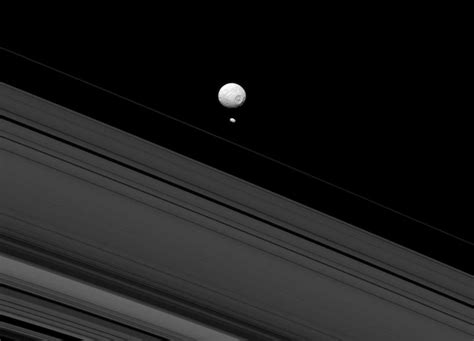 Cassini Camera Captures Saturns Moons Mimas And Pandora Spaceref