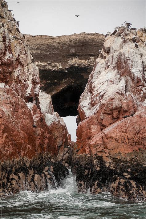 Rocky Arch Behind Two Outcrops Del Colaborador De Stocksy Ben Ryan