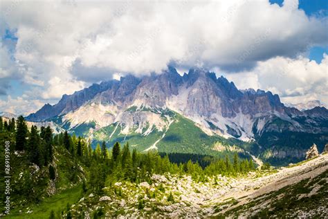 Monte Cristallo In Dolomites Mountains Italy With Big White Clouds