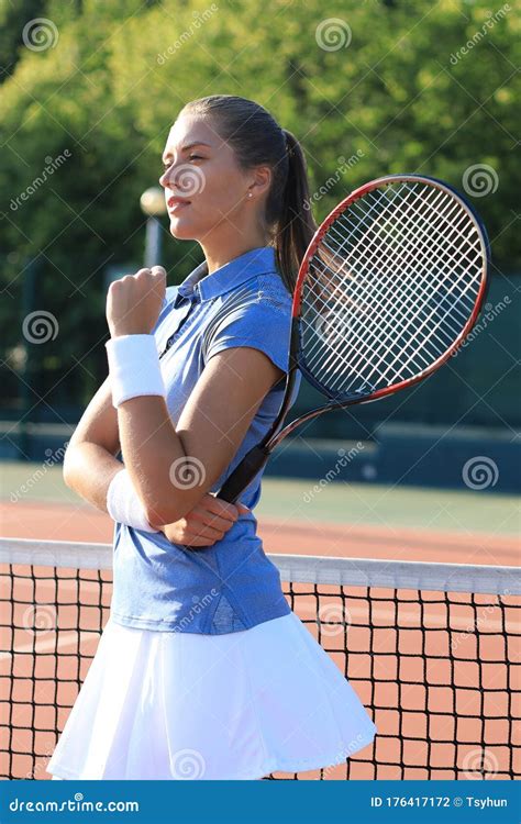 Woman Tennis Player Showing Yes Gesture After Winning Point Successful