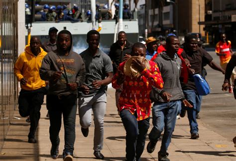 Police And Protesters Clash In Zimbabwes Capital Pbs Newshour