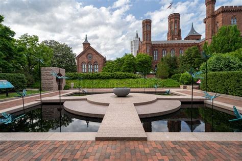 The Moongate Garden With Dragonfly Statues In The Enid Haupt Garden And