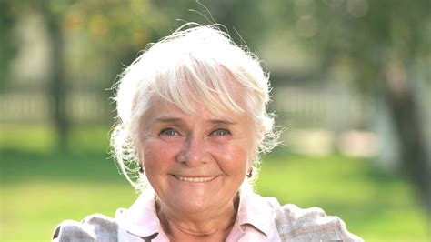 Thoughtful Senior Woman Smiling Joyful Old Lady Basics Of Positive Thinking Stock Video