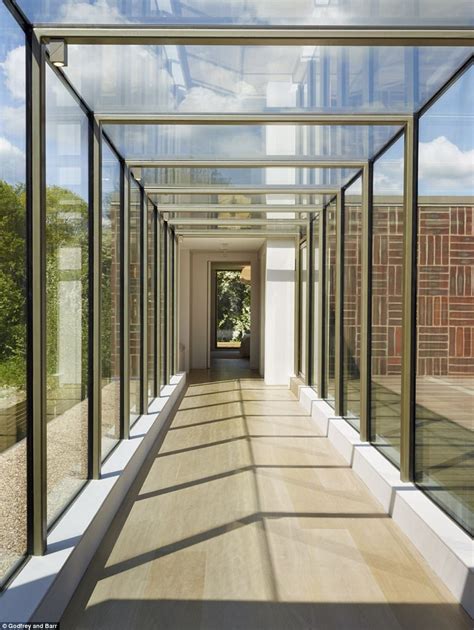 Walk This Way A Glass Encased Walkway Takes Potential Buyers From One