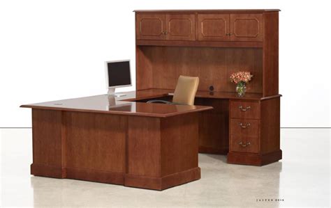 Jasper desk's new connection modular and freestanding desk series shown here with riley, a new offering of office and conference seating. Jasper Desk — Hallmark Office Furniture