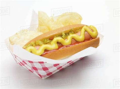 A Hot Dog With Potato Crisps Stock Photo Dissolve