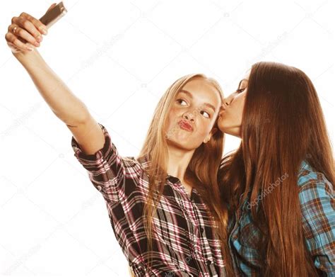 adolescentes mignonnes faisant selfie isolé image libre de droit par iordani © 78439196