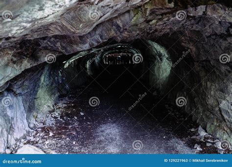 Dark And Scary Caves With A Long Tunnel Stock Image Image Of Colorful