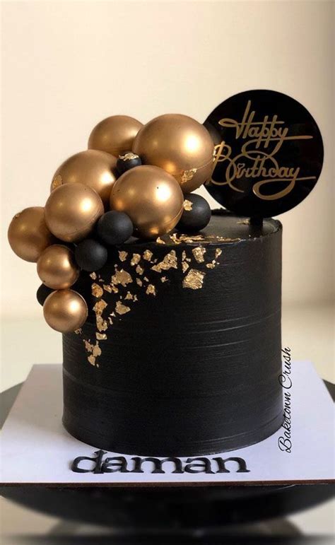 2 Black Birthday Cake Topped With Gold Balls We Love To Eat Cakes No