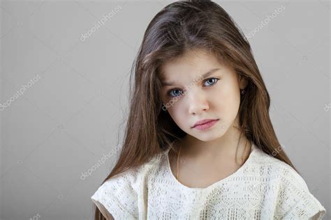 Portrait Of A Charming Brunette Little Girl — Stock Photo © Arkusha