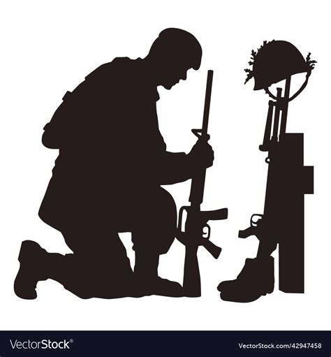 Soldier Kneeling At Memorial
