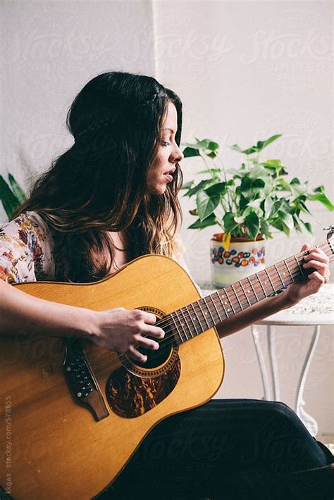 Beautiful Hippie Woman Playing Guitar By Stocksy Contributor Kkgas