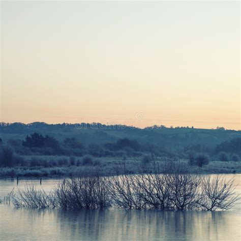 Beautiful Vibrant English Countryside Lake Image With Frost And Stock