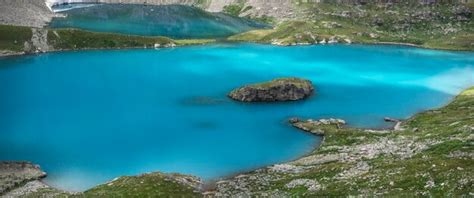 Premium Photo Panoramic View Of Blue Lake Water With Island