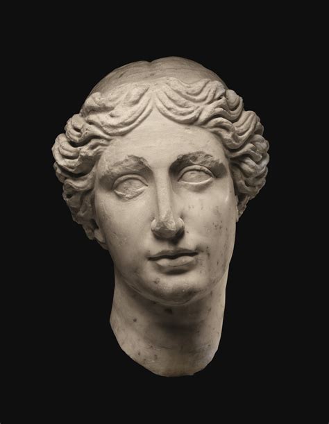 18 A Fragmentary Roman Marble Head Of A Goddess Circa 2nd Half Of The 2nd Century Ad A