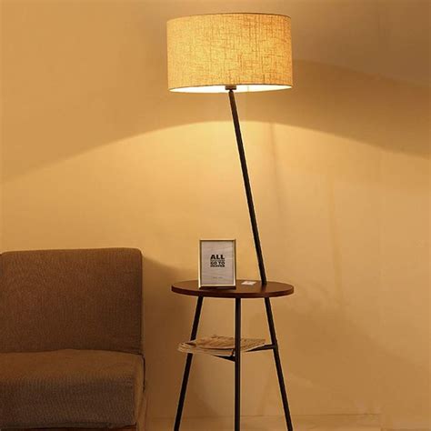 With details like wood and brass finishes, spotlights and more, tripod floor lamp designs are proof that great things come in threes. Tripod Floor Lamp with Wooden Shelves | Floor lamps living ...