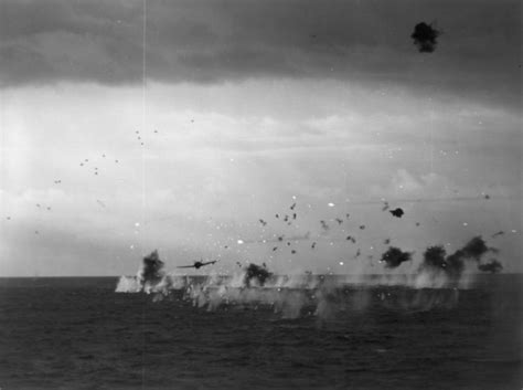 A Japanese Jill Torpedo Bomber Flying Through Hail Of Aa Fire Toward