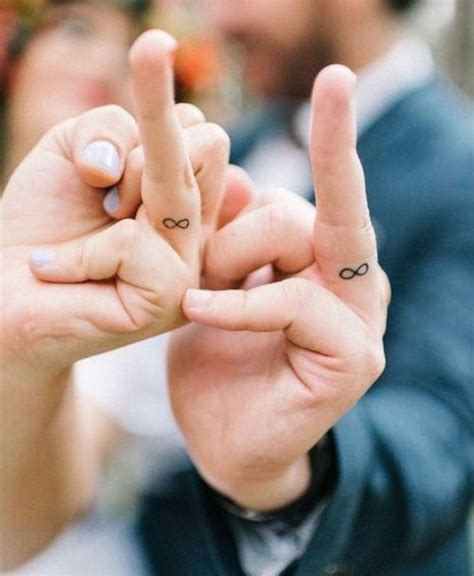 50 Delicate And Tiny Finger Tattoos To Inspire Your First Or Next Body Art Wedding Band