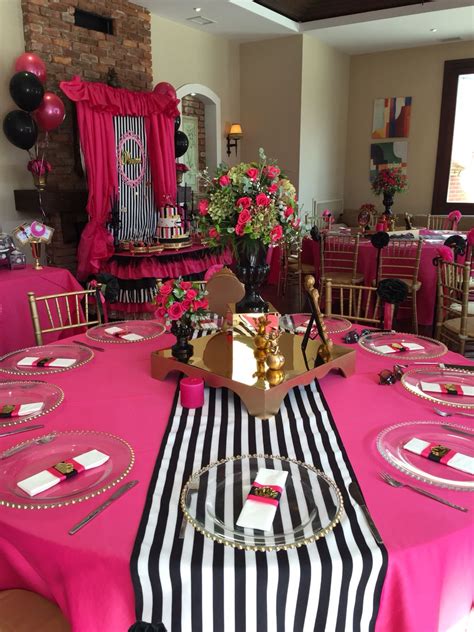 Pink, gold and black party tassels make a sparkly statement. Pink & black & gold | Birthday decorations, Table decorations, Decor