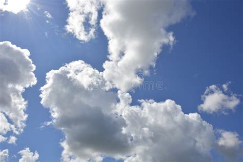 White Clouds Float Across The Sunny Sky Beautiful Atmospheric