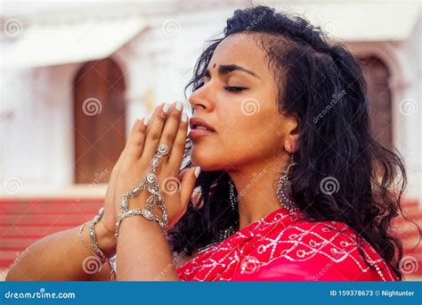 Young Indian Woman In Traditional Sari Red Dress Praying In A Hindu Temple Goa India Hinduism