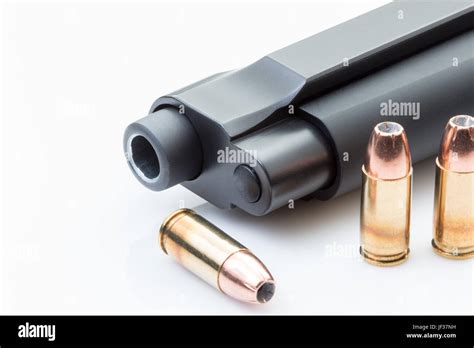 Handgun Barrel And Bullets On White Background Stock Photo Alamy