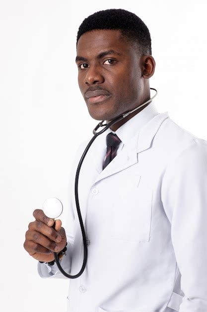 Premium Photo Young African Doctor On An Isolated White With A